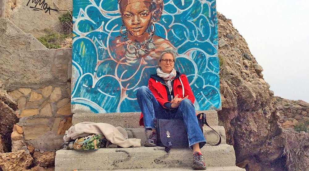 Ursula in front of a picture